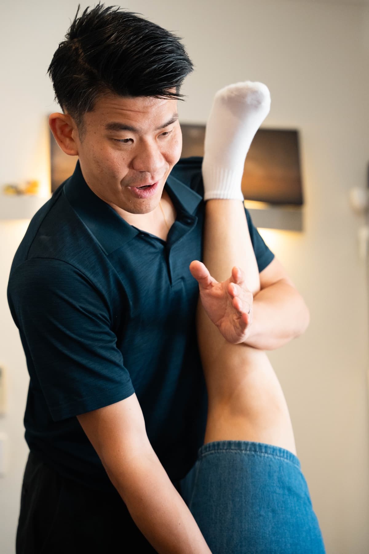 Dr Allan Chan treating a patient